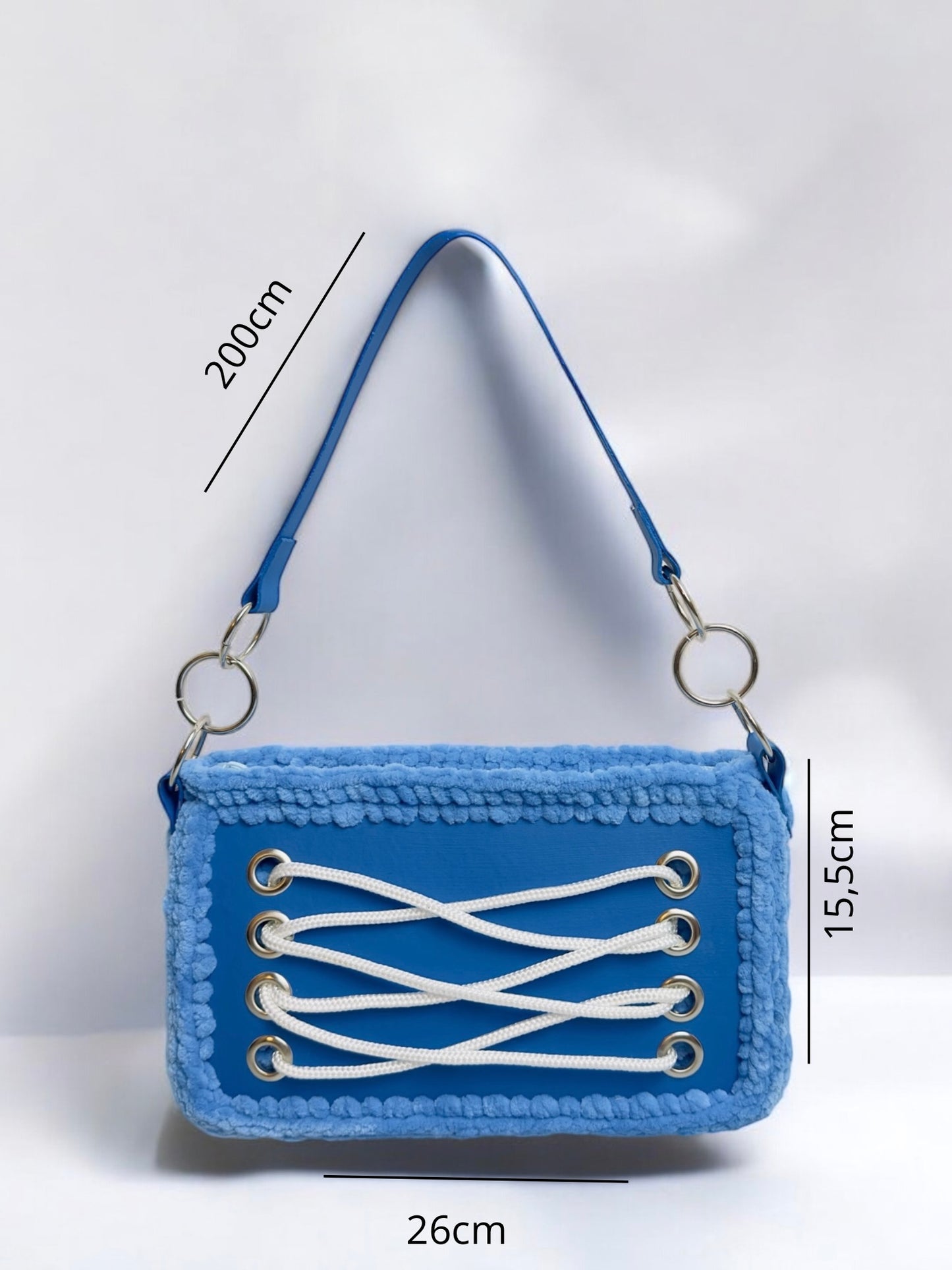 Trendy blue handbag, bag with wool borders and rope detail