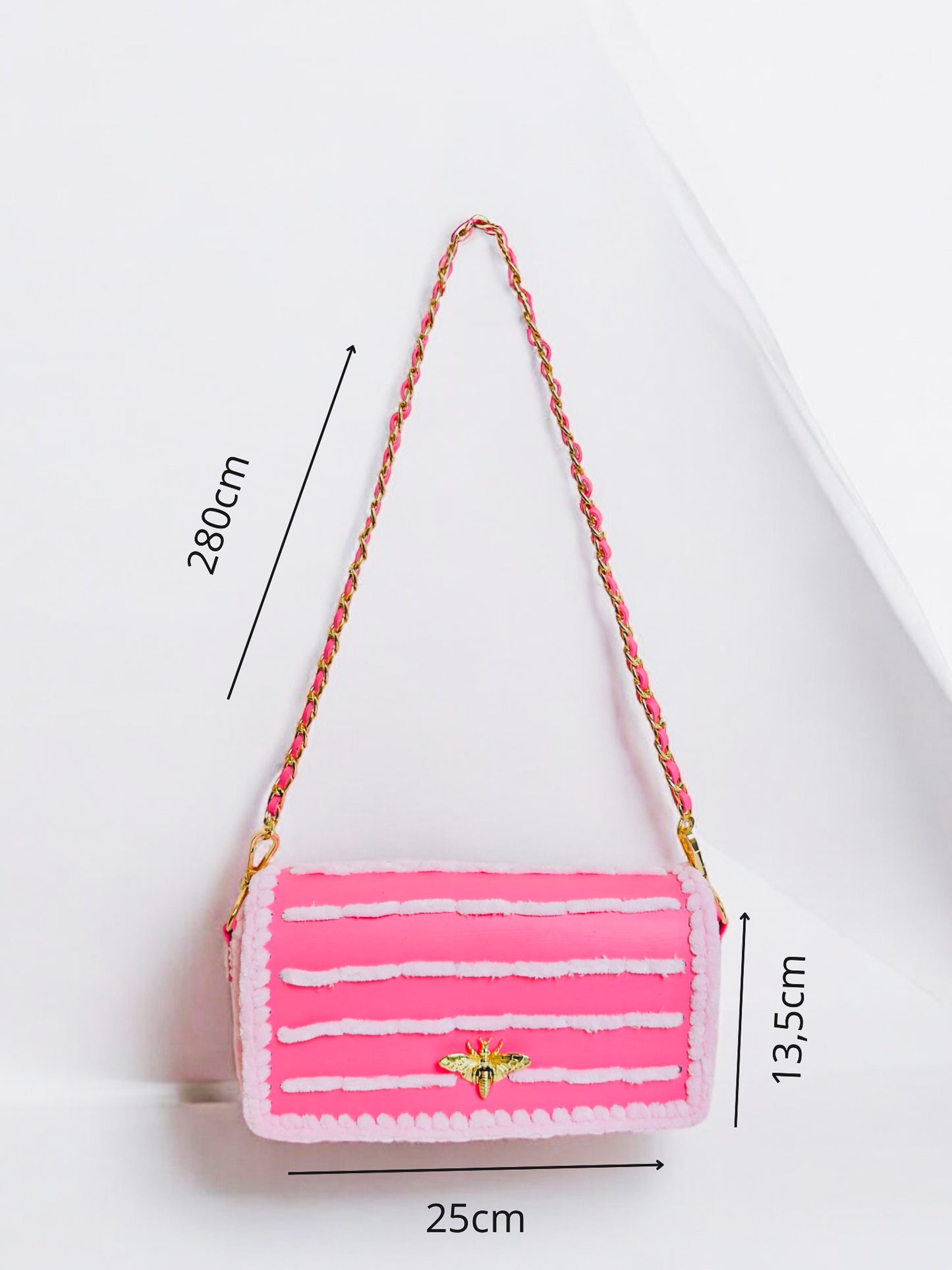 Trendy pink handbag with stripes